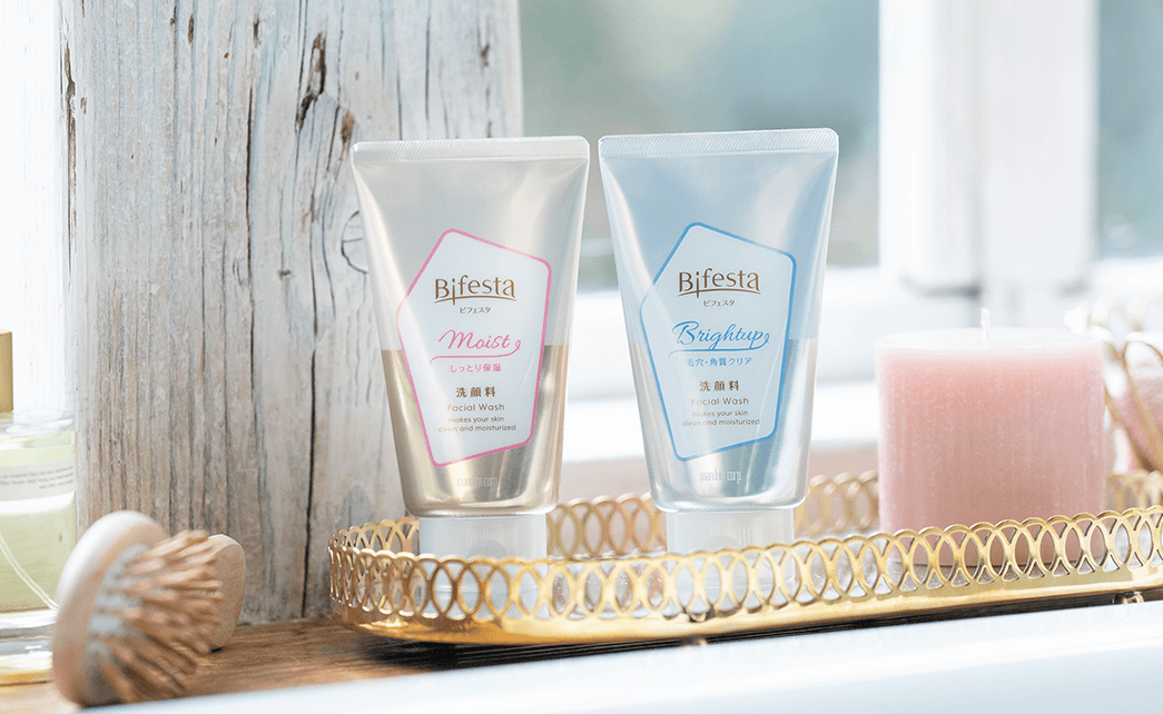Bifesta facial wash range displayed in a bathroom